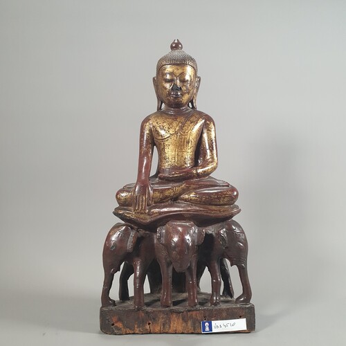 A Burmese Buddha in carved, lacquered and gilded wood 17th century