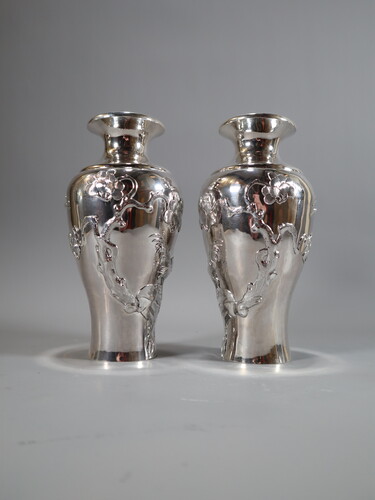 Pair of asian silver vases